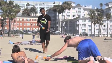 squirting hot girls on the beach prank 2015 youtube