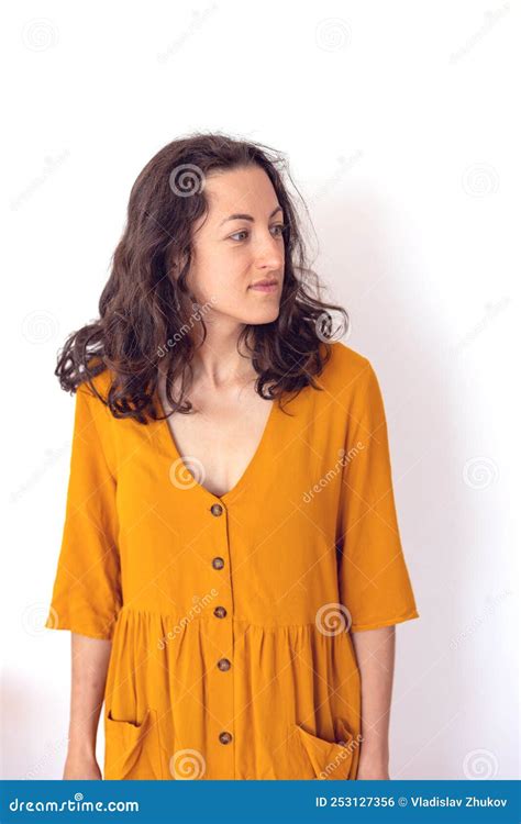 Woman In Yellow Dress Smiling Girl At Home Stock Photo Image Of