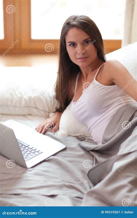 Beautiful Brunette Lying On Bed At Home Stock Image Image Of Breast