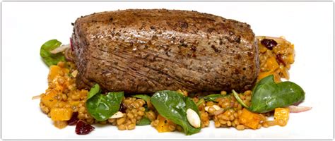 Top slices of beef tenderloin with a rich sauce of cremini mushrooms and sweet red wine. Beef Tenderloin w/Butternut Squash & Farro Salad