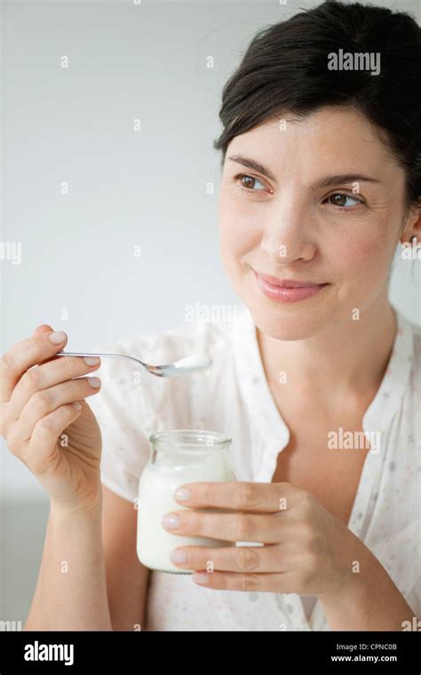 Yoghurt Spoon Eating Woman Hi Res Stock Photography And Images Alamy