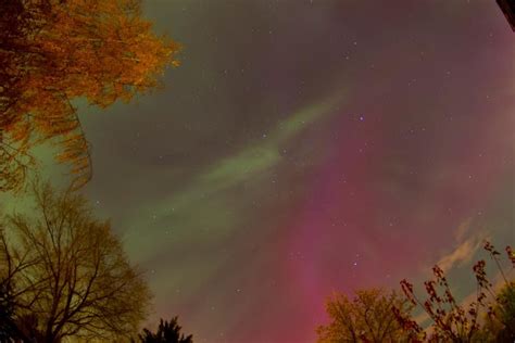 The Aurora Borealis Or Northern Lights Are An Ethereal Display Of