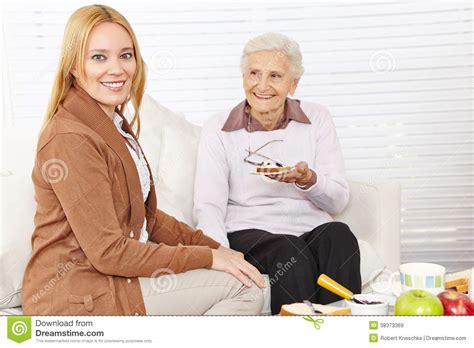 Senior Woman And Caregiver Eating Stock Image Image Of Citizen