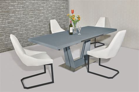 A weathered gray finish and robust, turned pedestal base give the. Matt Grey glass dining table and 6 white chairs - Homegenies