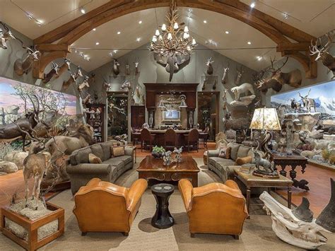 Wanna ask the girls a question? man cave safari | Man cave wall decor, Trophy rooms, Epic man cave ideas