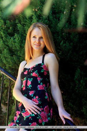 Teen Redhead Starts Taking Dress Off On The Stairs And Poses Nude On
