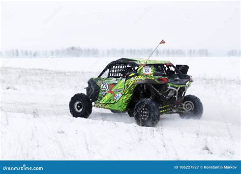 4wd Atv Vehicle Rushes On The Snow Covered Road Editorial Photography