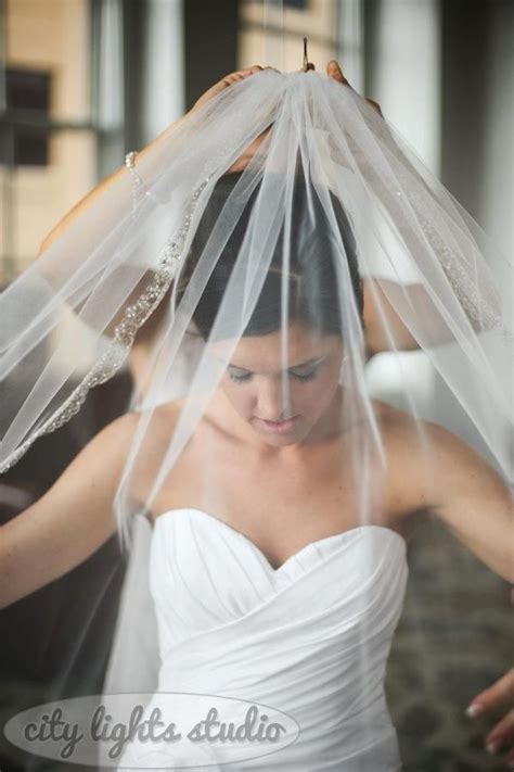 Amazing Shot Of Bride Placing Her Veil Bride Strapless Wedding Dress Dresses