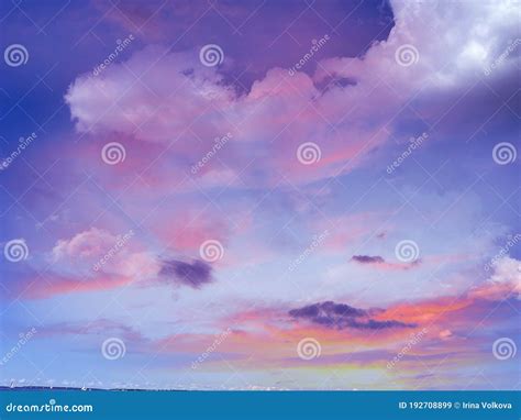 Beautiful Blue Pink Sunset Sky Fluffy Clouds And Sunlight Beams Skyline