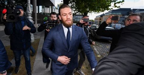 conor mcgregor fined €1 000 and convicted of assault on man in dublin pub who refused offer of