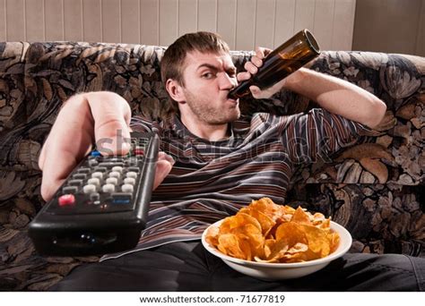 Man Beer Chips Watching Tv Home Stock Photo Edit Now 71677819