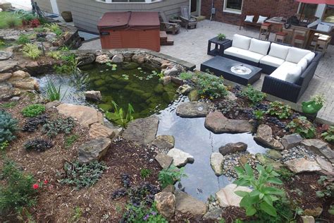 Each person has their own unique taste in, well, everything, from how in ponds with substrate bottoms, the males will dig a small pit, called a redd. 9 Steps For Building A Backyard Pond In Des Moines | Just ...
