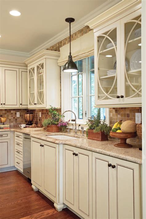 No one has to settle for builder's grade kitchen cabinet styles anymore. Creative Kitchen Cabinet Ideas - Southern Living