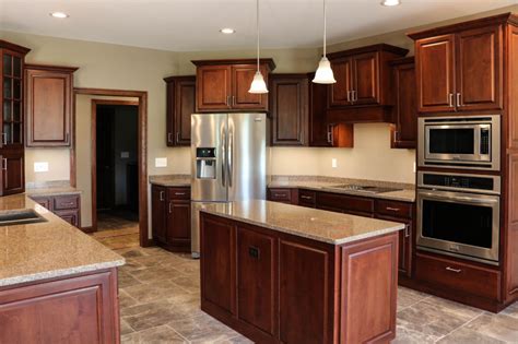 Those small cabinet door towel racks can be flipped around so the rung is on the inside of the if there's no room in the drawers or on the countertop for a knife block. 6 Brown Quartz Countertop Design Ideas for a Neutral Kitchen