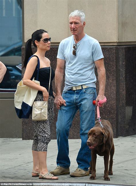 Lucy Liu Strolls Hand In Hand With Mystery Man As Pair Enjoy A Spot Of