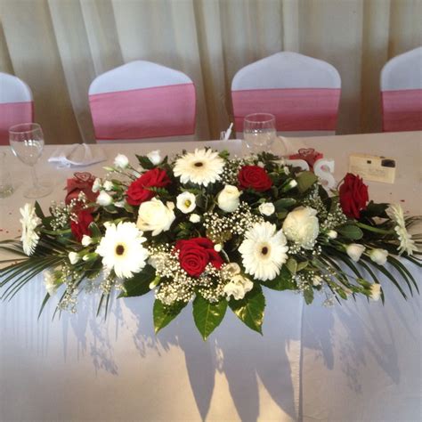 Top Table Arrangement In Roses And Gerbera Red And White In 2019
