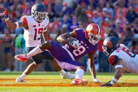 Their pants are plain gold, following clemson's less is more approach. Thread by @apthirteen, When Clemson runs down the Hill on ...