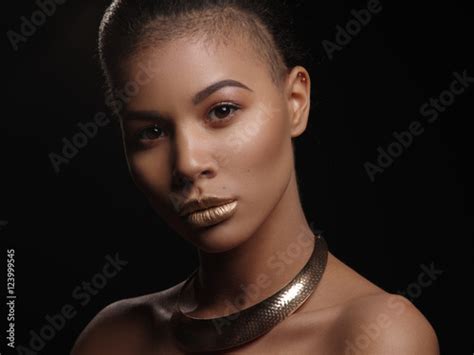 Portrait Of An Extraordinary Beautiful Naked African American Model With Perfect Smooth Glowing