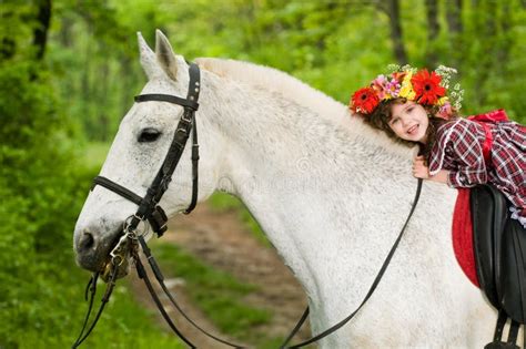 Little Girl Riding Horse Stock Photo Image Of Garland 9437252