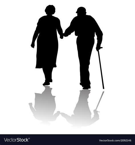 An Old Couple Holding Hands Walking Down The Street Silhouetted Against