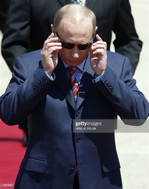 Russian President Vladimir Putin Adjusts His Sunglasses As He Arrives News Photo Getty Images