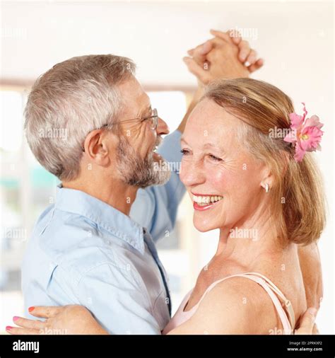 Were Still Perfect Partners A Mature Couple Dancing Joyfully With Each Other Indoors Stock