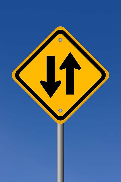 Two Way Traffic Sign Stock Photos Pictures And Royalty Free Images Istock