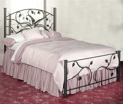 Measure the width of the structure of the wrought iron bed with a ribbon. Wrought iron bed furniture designs. | An Interior Design