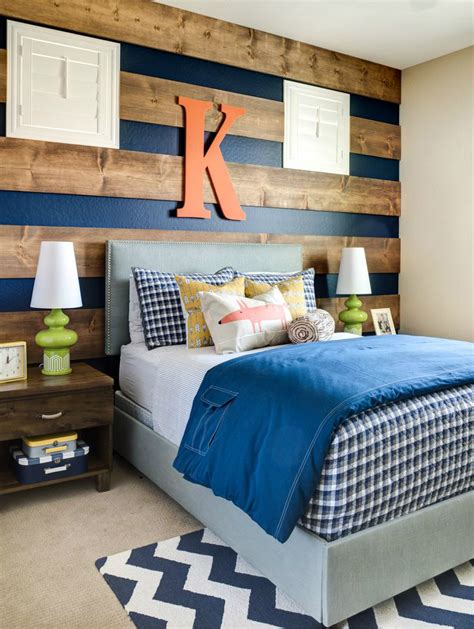 In this boy's bedroom designed by barry dixon, the various prints bring intrigue to the calming blue tones used throughout. 7 Inspirational Ways To Decorate A Boys' Bedroom - Decoholic