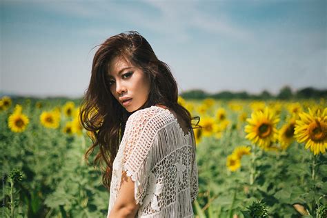 Woman In The Sunflower Field By Stocksy Contributor Marija Savic