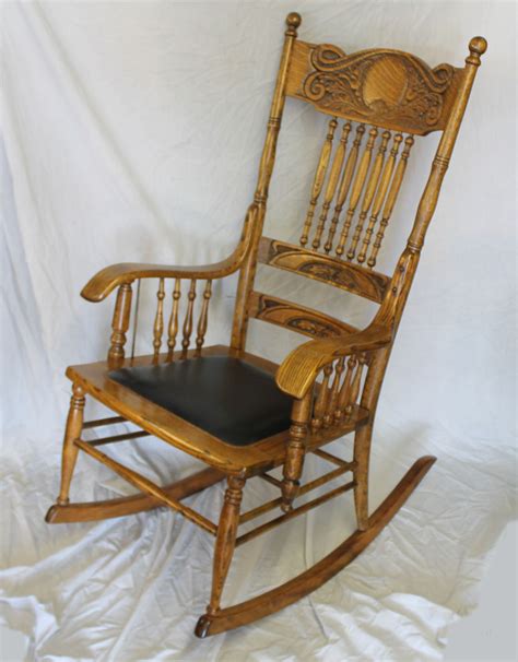 You'll need to sand or paint the chair, however you want to prepare it. Bargain John's Antiques | Antique Oak Carved back Rocking Chair - Bargain John's Antiques
