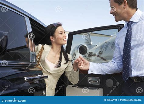 Happy Business Couple Getting Off A Car Stock Image Image Of Airplane Korean 29652991
