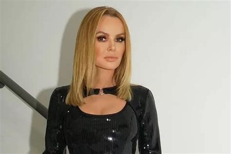 Amanda Holden Thrills Fans As She Flashes Cleavage In Cut Out Minidress