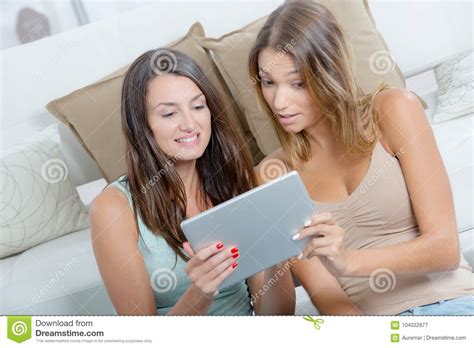 Girl Friends Sharing Information From Internet Stock Image Image Of