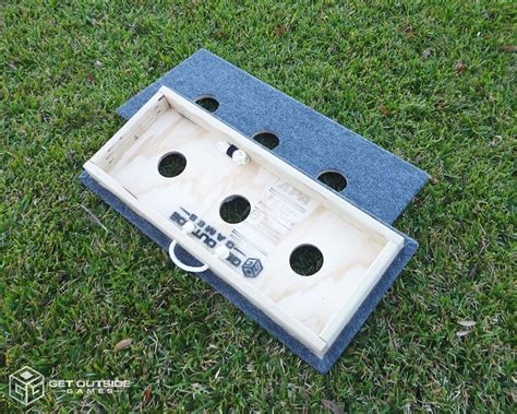 Each time both sets of washers (all 6) are tossed, the points scored for each team are compared and the team which scored the most points is awarded the difference in the points just scored. Classic 3 Hole Washer Toss Boards / Sets