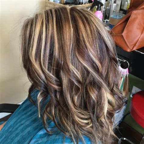 Although the hair color doesn't completely fall in the genre of being blonde but the highlight in the tips that it offers is stylish to carry. Ash Blonde and Chocolate Streaks | Red hair with blonde ...