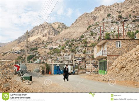 Kurdish Man Walk On Rural Road From The Old Mountaine