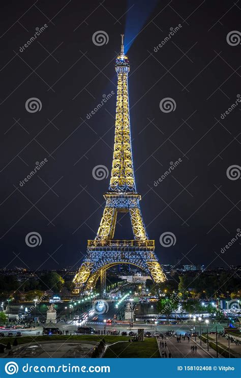 Panorama Of Night Paris With Luminous Yellow And Blue Lights Eiffel