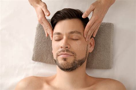 Handsome Man Having Facial Massage In Spa Salon Stock Image Image Of