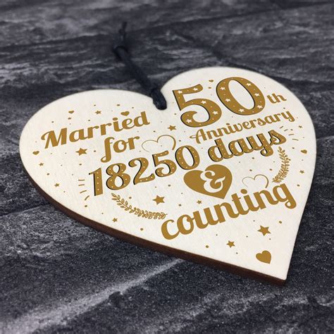 Jul 19, 2021 · an ideal 25th anniversary or 10th year anniversary gift idea, this frame has a brushed silver plate with it, which you can personalize with the couple's names, wedding dates, and/or what anniversary it is. 50th Wedding Anniversary Wood Heart Gift Gold Fifty Years ...