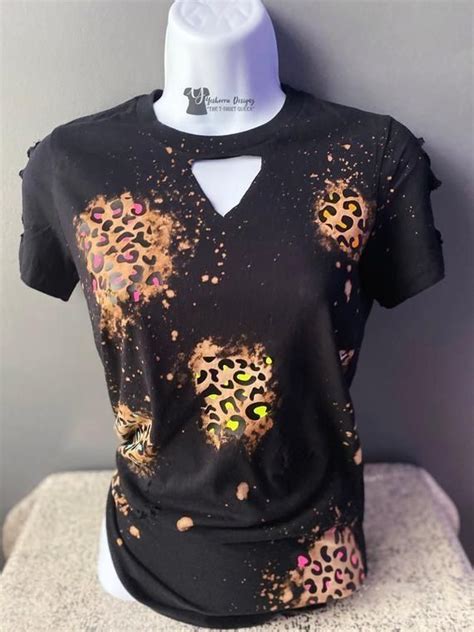 However, clothing retailers are known to charge premiums on distressed items. Bleach Distressed Shirt For Women, Rainbow Leopard Print Shirt, Festival Shirt, ... | 1000 in ...
