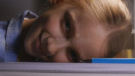 Child Studying In Night Bored Kid Writing In Dark Tired Student