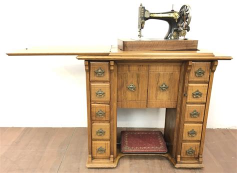 lot vintage singer sewing machine and oak cabinet