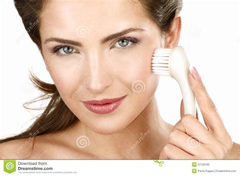 Closeup Of A Beautiful Woman Applying A Beauty Treatment Stock Image