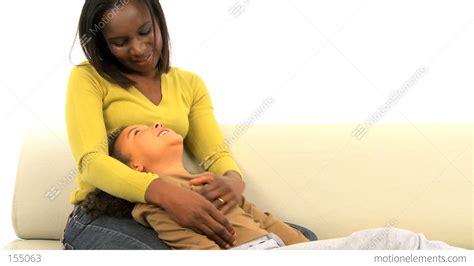 African American Woman Tickling Her Cute Daughter Stock Video Footage