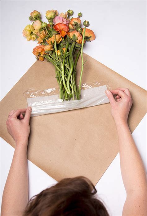 Bouquet of several kinds of flowers. How to Wrap Fresh Flowers (+ a genius freshness trick so ...