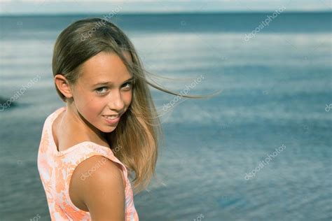 Beautiful Teenager Girl Near The Sea Stock Photo By ©absurdov 122415016