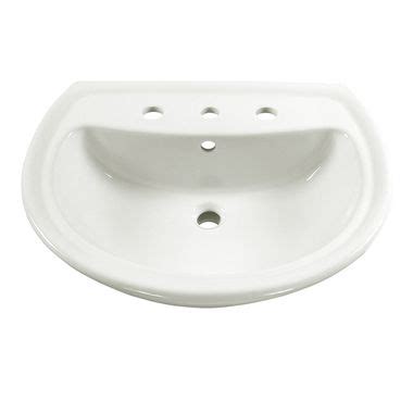A White Bathroom Sink With Two Holes On The Side And One Hole In The Middle