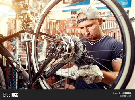 Bicycle Mechanic Image & Photo (Free Trial) | Bigstock