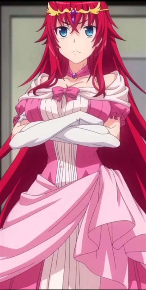 An Anime Character With Long Red Hair Wearing A Pink Dress And Holding